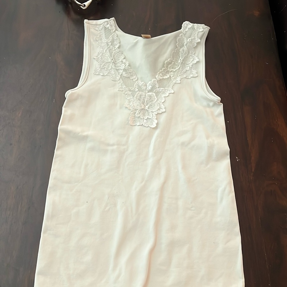 Very light mint green top. Super soft